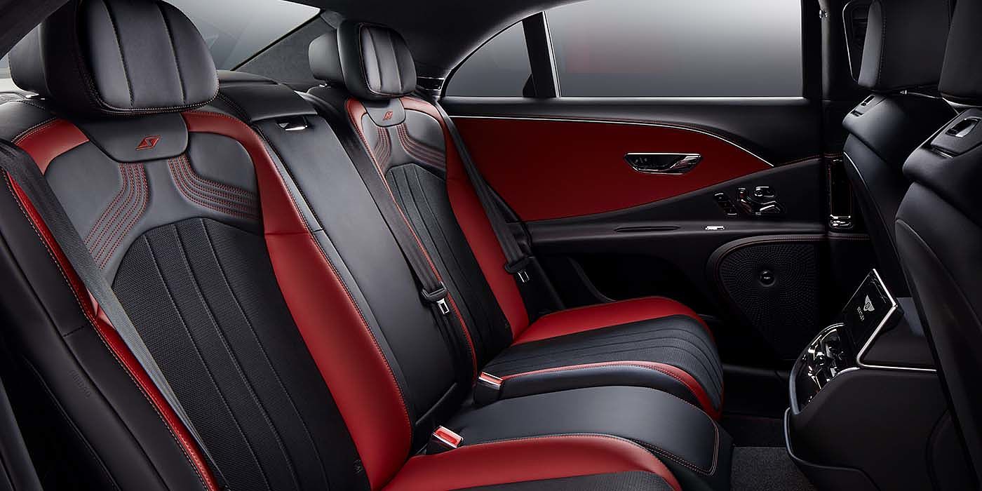 Bentley Padova Bentley Flying Spur S sedan rear interior in Beluga black and Hotspur red hide with S stitching