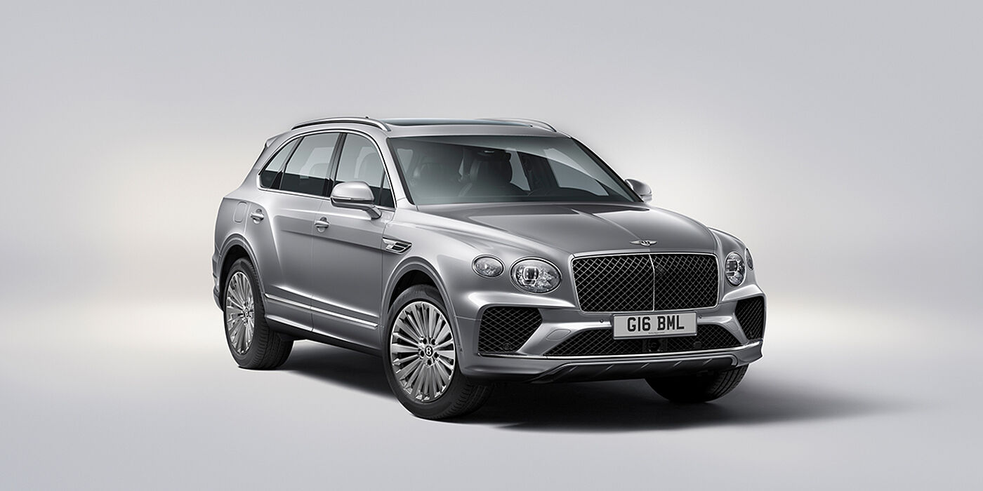 Bentley Padova Bentley Bentayga luxury SUV front three quarter view in Moonbeam paint with matrix grille and 21″ 5 spoke painted wheels