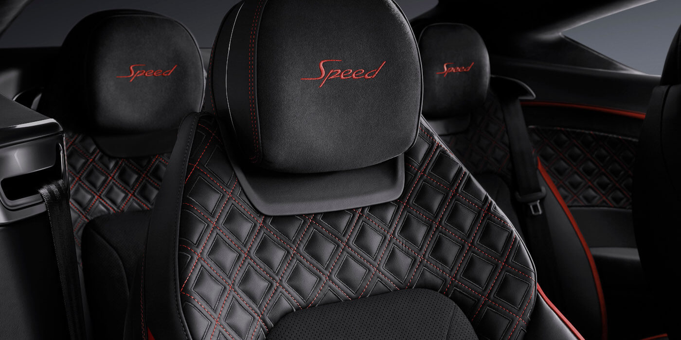 Bentley Padova Bentley Continental GT Speed coupe seat close up in Beluga black and Hotspur red hide