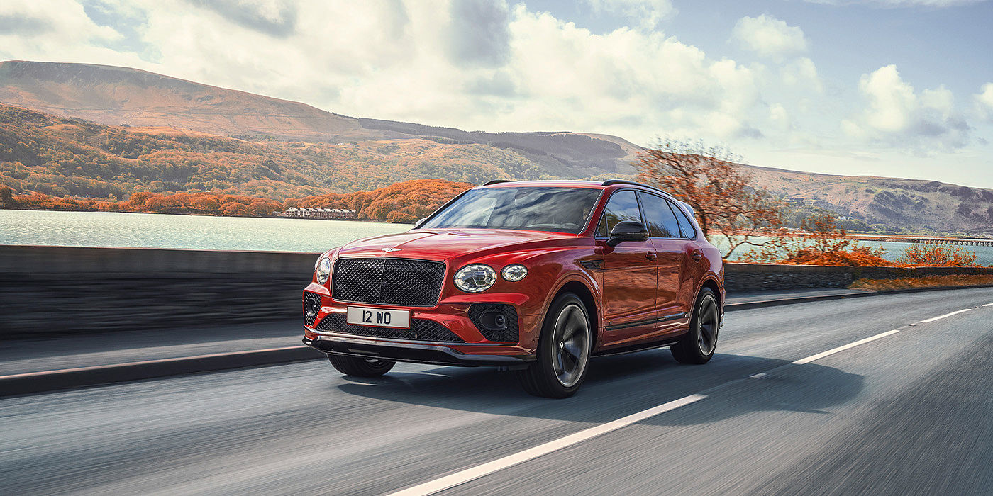 Bentley Padova Bentley Bentayga S SUV in Candy Red paint front 34 dynamic