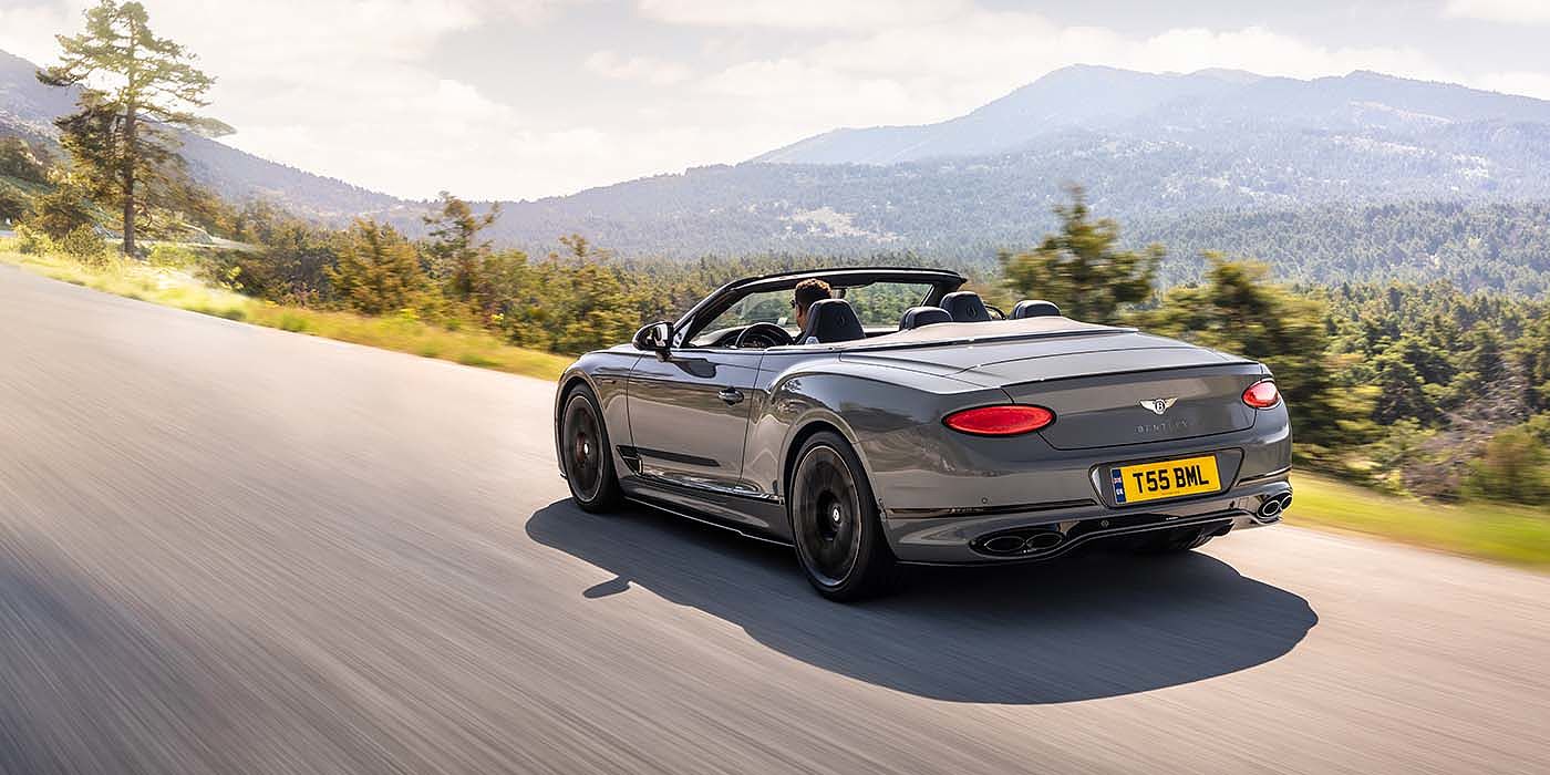 Bentley Padova Bentley Continental GTC S convertible in Cambrian Grey paint rear 34 dynamic driving