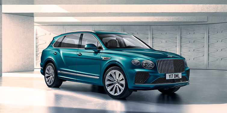 Bentley Padova Bentley Bentayga Extended Wheelbase Azure SUV front three quarter in Topaz blue paint colour with a grey background