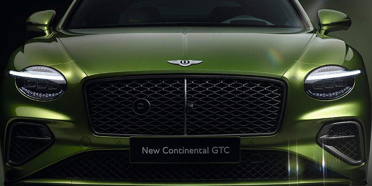 Bentley Padova Bentley Continental GTC Speed convertible front bonnet detail in Tourmaline Green paint showing new light design