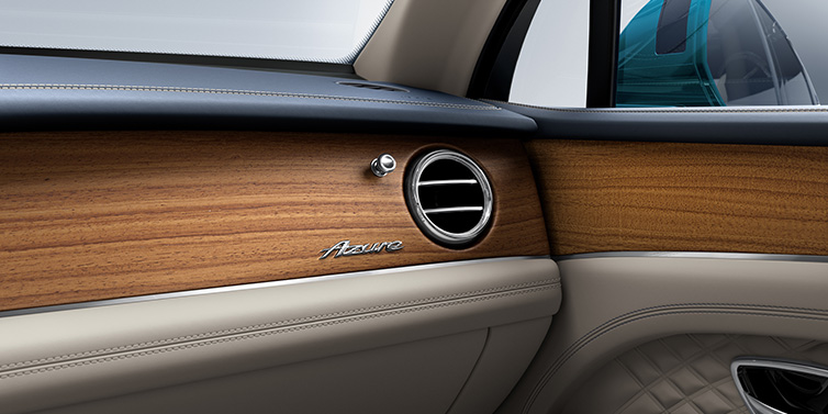 Bentley Padova Bentley Bentayga Extended Wheelbase Azure front dash showing Open Pore Koa veneer surrounded by Portland and Imperial Blue hides